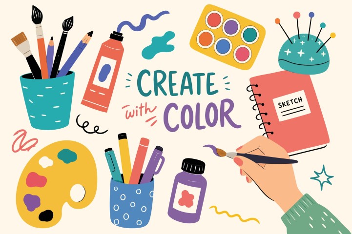 Artistic workspace composition with creative tools and painting hands.